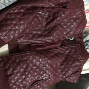 A maroon colored leather jacket 🥰